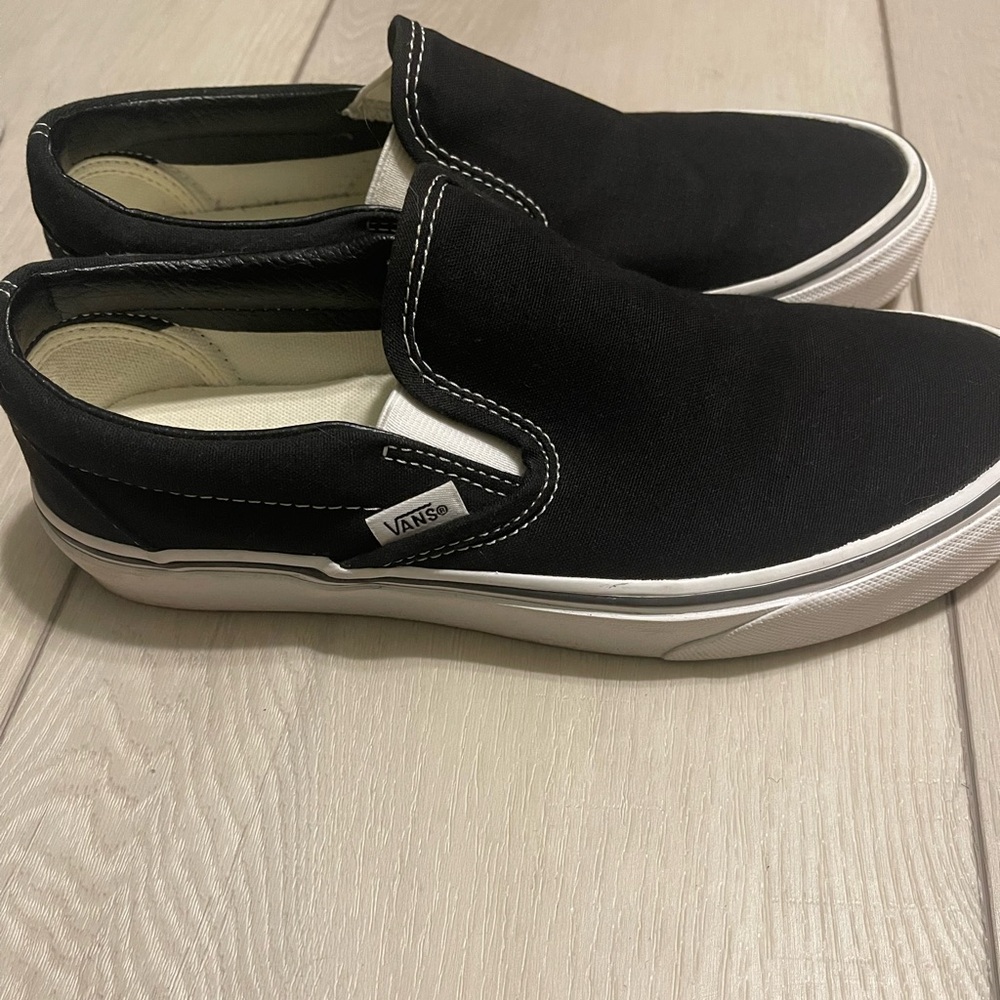 Vans Black and White Slip-On Sneakers Classic Design